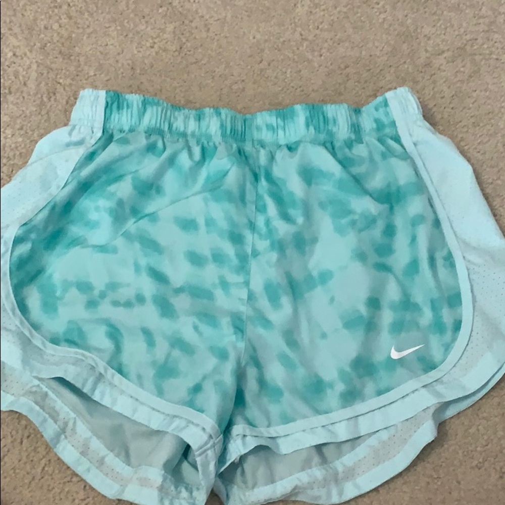 Mint green Nike running shorts